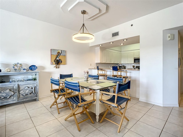 view of tiled dining space