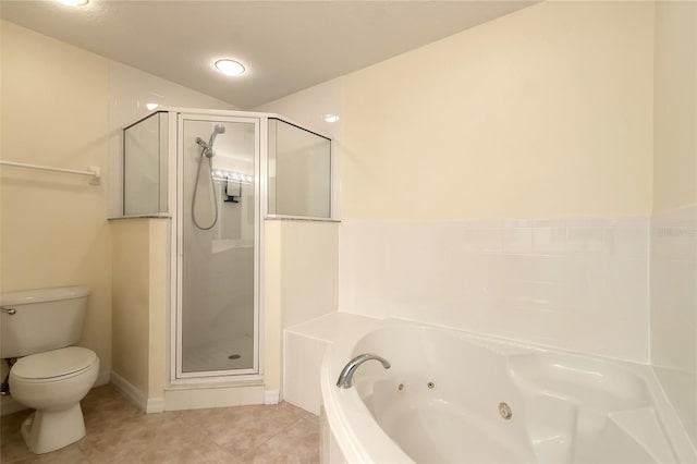 bathroom featuring shower with separate bathtub, tile patterned flooring, and toilet