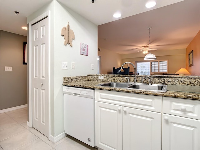 kitchen featuring light tile patterned flooring, white dishwasher, sink, and white cabinets