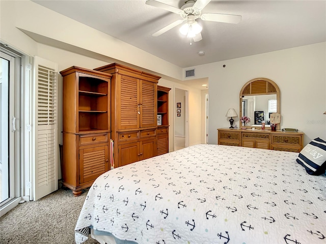 carpeted bedroom featuring ceiling fan