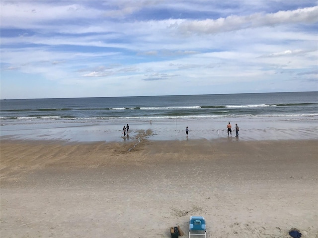 view of water feature with a beach view