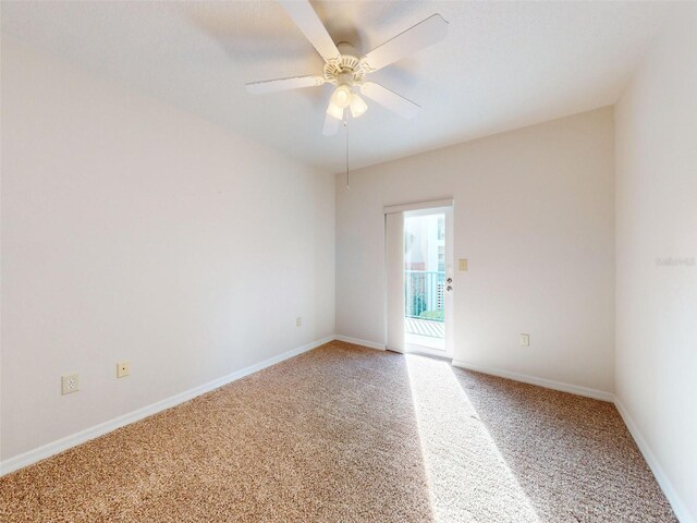 5300 S Atlantic Ave Unit 9201, New Smyrna Beach, FL 32169 - spare room with light carpet and ceiling fan