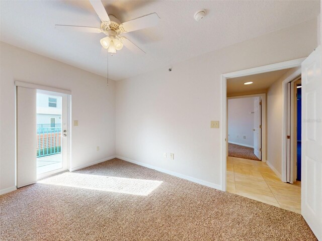 5300 S Atlantic Ave Unit 9201, New Smyrna Beach, FL 32169 - spare room with light carpet and ceiling fan