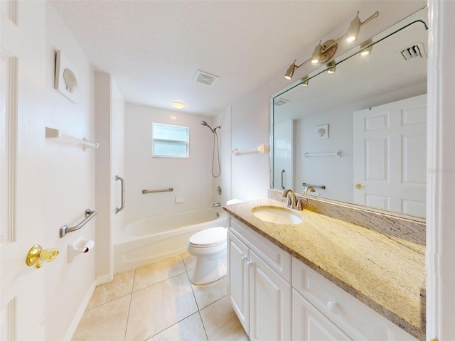 5300 S Atlantic Ave Unit 9201, New Smyrna Beach, FL 32169 - full bathroom featuring toilet,  shower combination, tile flooring, a textured ceiling, and vanity