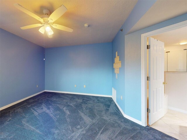 5300 S Atlantic Ave Unit 9201, New Smyrna Beach, FL 32169 - unfurnished room featuring light colored carpet and ceiling fan