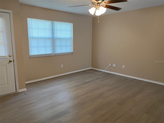 unfurnished room with light hardwood / wood-style floors and ceiling fan