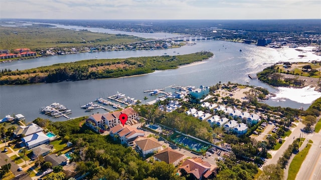 drone / aerial view with a water view