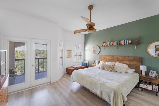 bedroom with french doors, ceiling fan, light hardwood / wood-style floors, and access to outside