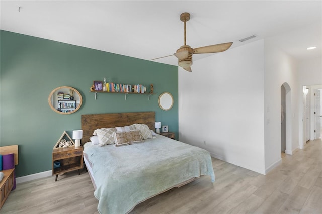 bedroom featuring ceiling fan and light wood-type flooring