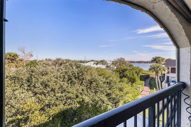 balcony featuring a water view