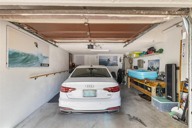 garage featuring a garage door opener