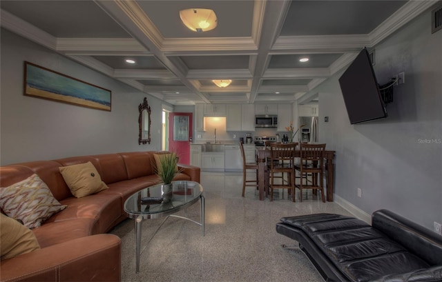 living room with coffered ceiling, ornamental molding, sink, and beamed ceiling