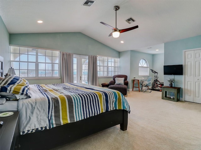 bedroom featuring lofted ceiling, carpet, ceiling fan, and french doors