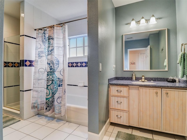 bathroom featuring oversized vanity, shower / bath combo with shower curtain, and tile flooring