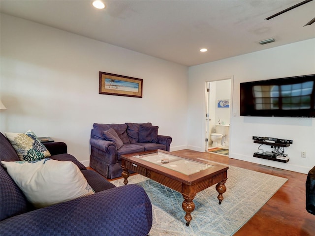 living room with ceiling fan