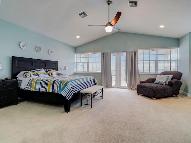 carpeted bedroom with french doors, access to exterior, ceiling fan, and vaulted ceiling