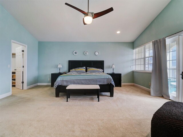 bedroom featuring light colored carpet, ceiling fan, and lofted ceiling