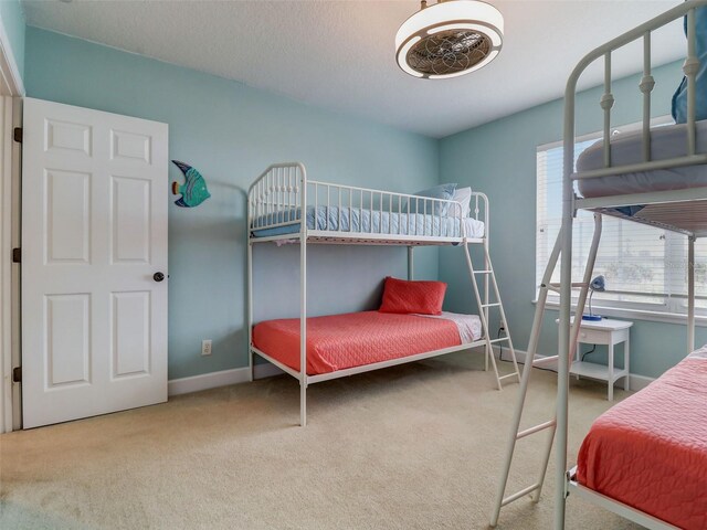 bedroom with light carpet