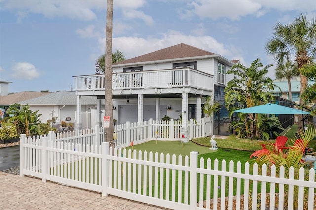 view of front facade featuring a garage and a front yard