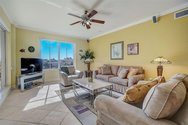 living room featuring light tile floors, ceiling fan, and crown molding