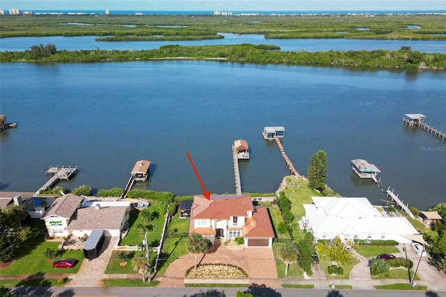 bird's eye view with a water view