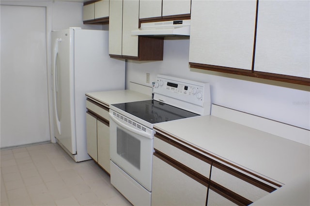 kitchen featuring white appliances