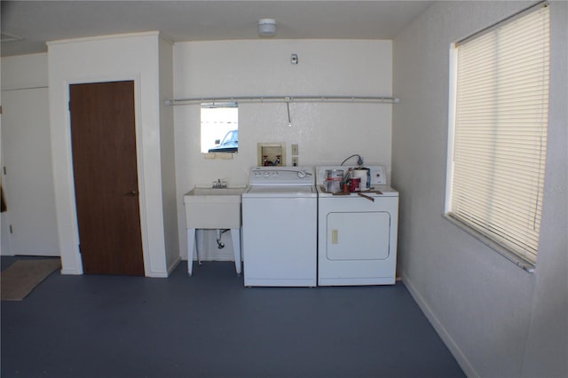 washroom featuring washer and clothes dryer