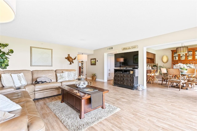 living room featuring light wood-type flooring