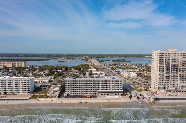 bird's eye view featuring a beach view and a water view