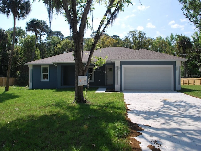 ranch-style house with a front yard and a garage