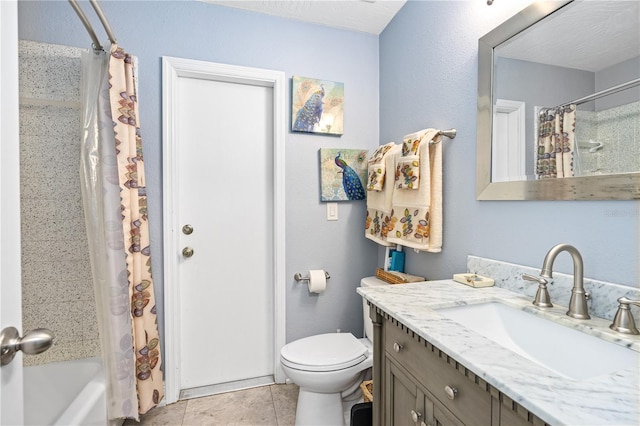 full bathroom with tile patterned floors, vanity, toilet, and shower / tub combo