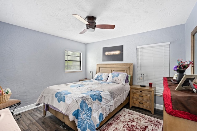 bedroom with ceiling fan and wood-type flooring