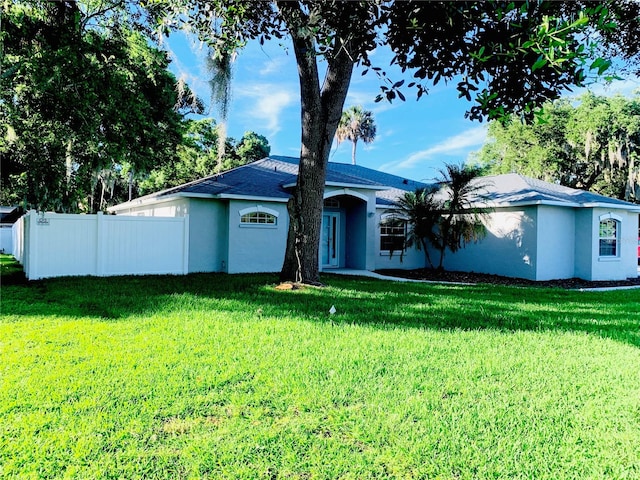 ranch-style house with a front yard