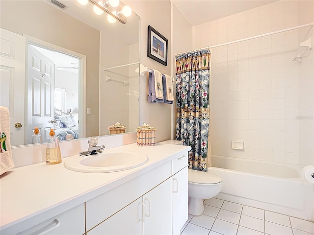 full bathroom featuring vanity, toilet, shower / bath combination with curtain, and tile patterned flooring