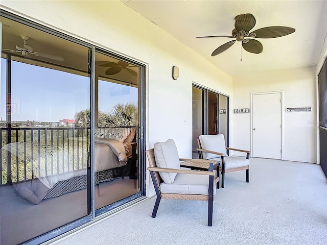 exterior space featuring ceiling fan