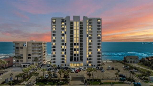 outdoor building at dusk with a water view