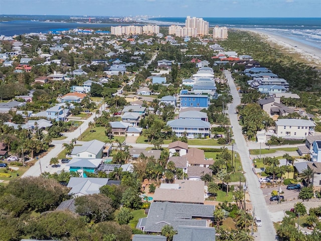 drone / aerial view with a view of the beach and a water view