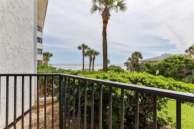 balcony featuring a water view