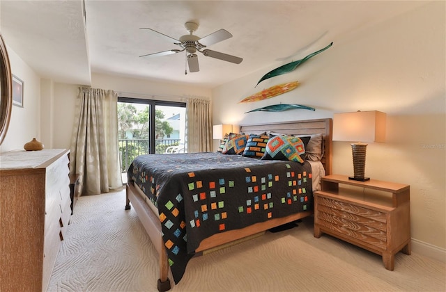 bedroom with ceiling fan, light carpet, and access to exterior