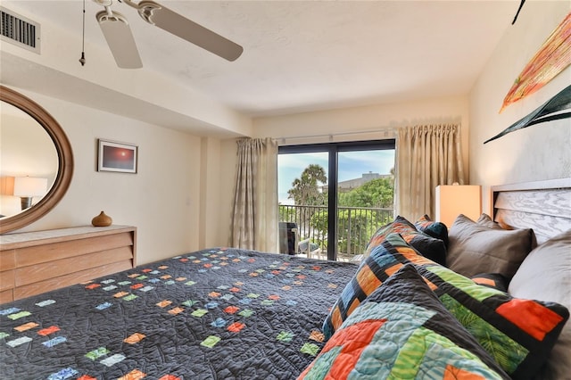 bedroom featuring ceiling fan and access to exterior