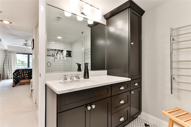 bathroom with vanity, tile patterned flooring, ceiling fan, and an enclosed shower