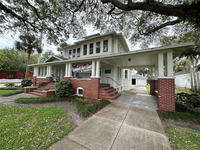 view of front of property with a carport