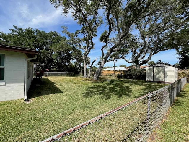 view of yard with a storage shed