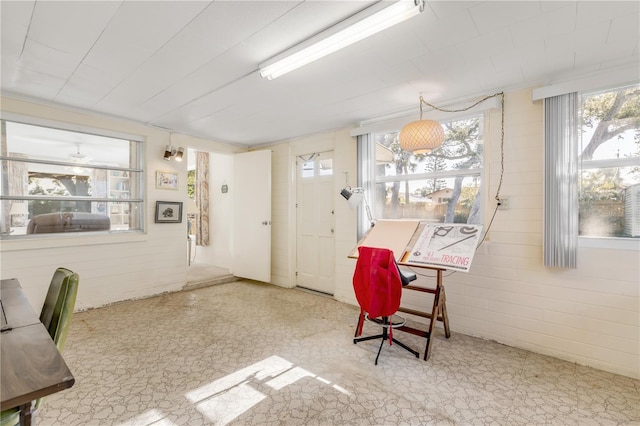 living area featuring tile flooring