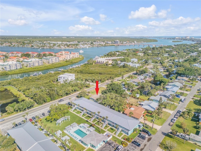 drone / aerial view with a water view