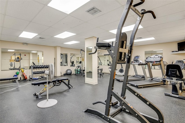 gym with a drop ceiling