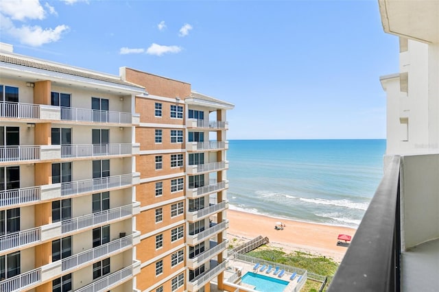 property view of water featuring a beach view