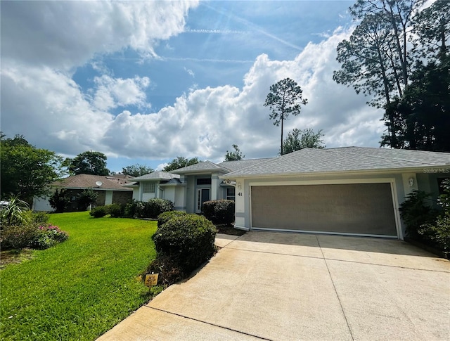 single story home with a front lawn and a garage