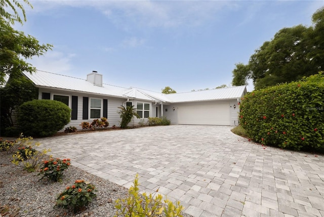 ranch-style home with a garage