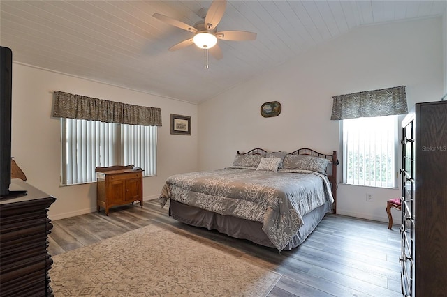 bedroom featuring lofted ceiling, wood-type flooring, wooden ceiling, and ceiling fan